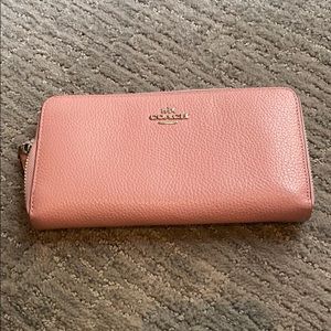 Coach pink leather zip around wallet. NEVER USED
